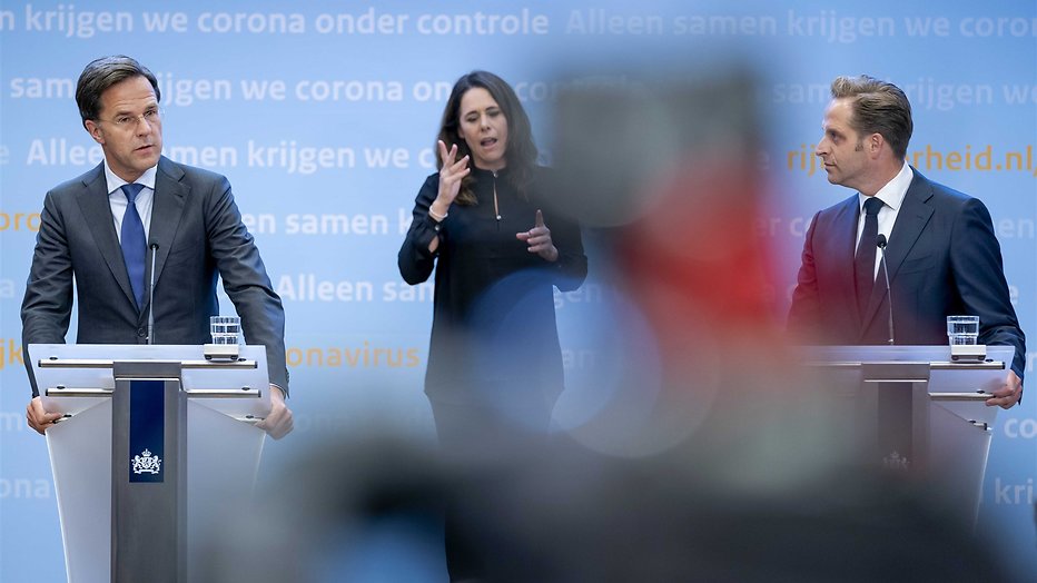 Mark Rutte, Irma Sluis en Hugo de Jonge bij de persconferentie van dinsdag 23 juni. Mark Rutte, Irma Sluis en Hugo de Jonge bij de persconferentie van dinsdag 23 juni.