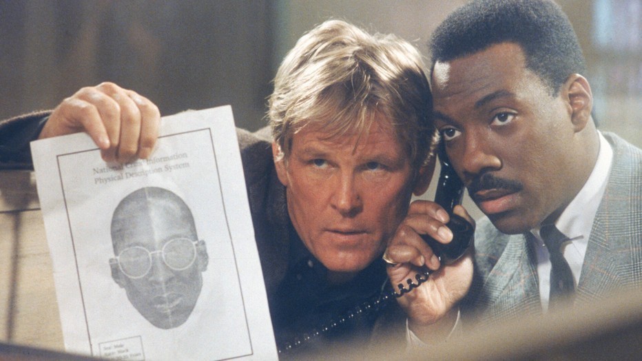 Eddie Murphy als Reggie Hammond en Nick Nolte als Jack Cates in Another 48 Hrs. Eddie Murphy als Reggie Hammond en Nick Nolte als Jack Cates in Another 48 Hrs.