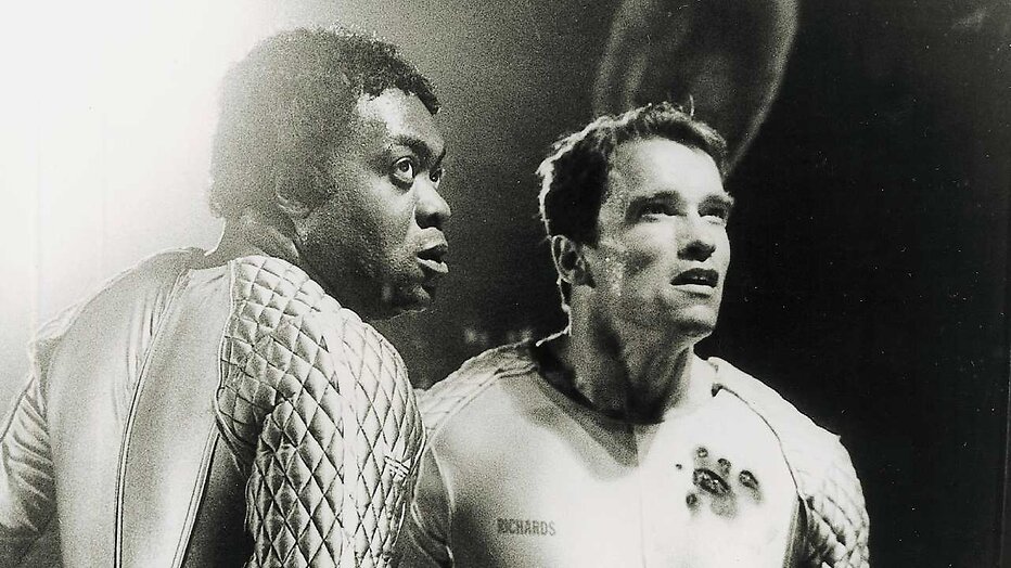 Arnold Schwarzenegger en Yaphet Kotto in The Running Man