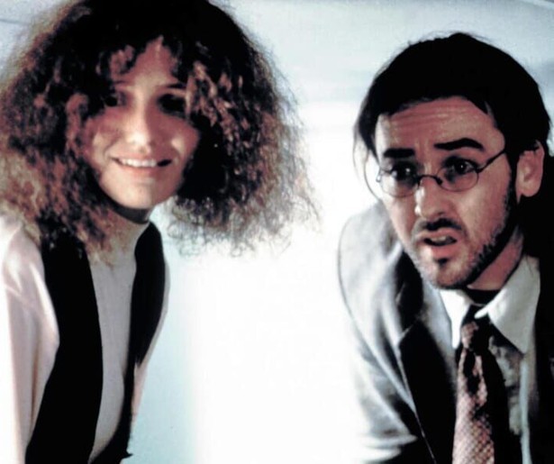 John Cusack zit in het hoofd van John Malkovich in Being John Malkovich 