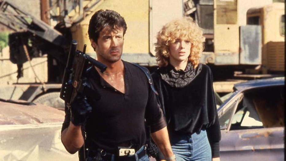 Sylvester Stallone en Brigitte Nielsen in Cobra Sylvester Stallone en Brigitte Nielsen in Cobra