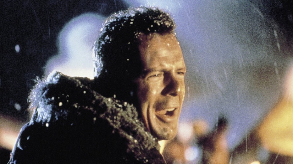 Bruce Willis als John McClane in Die Hard Bruce Willis als John McClane in Die Hard