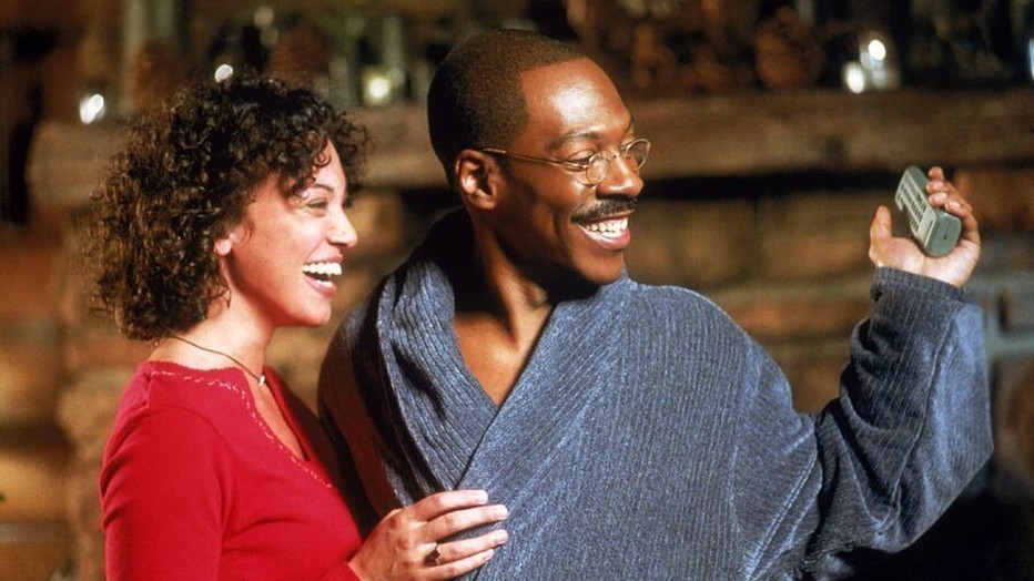 Kristen Wilson als Lisa Dolittle en Eddie Murphy als Dr. John Dolittle (Dr. Dolittle 2)