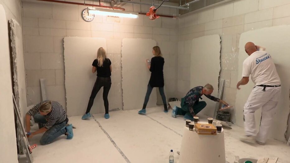 De familie Meiland tijdens het klussen De familie Meiland tijdens het klussen