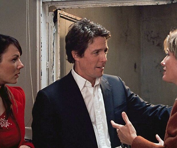 Premier Hugh Grant is smoorverliefd op zijn huishoudster in Love Actually