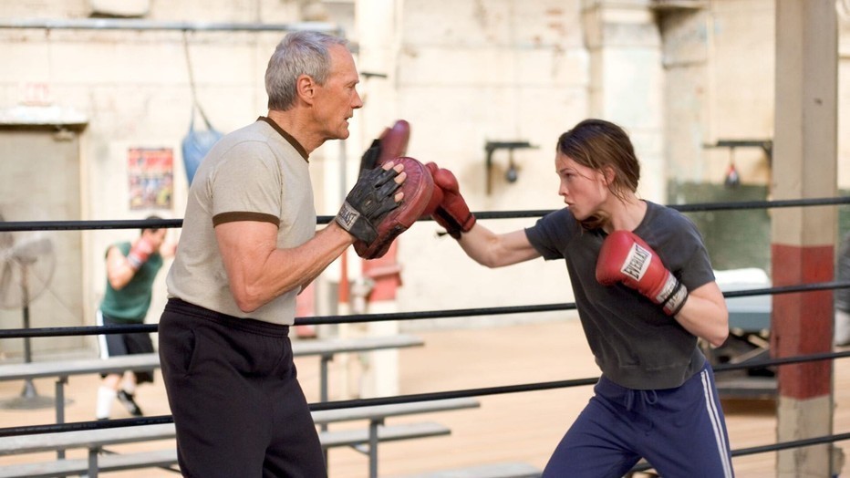 Hilary Swank als Maggie Fitzgerald en Clint Eastwood als Frankie Dunn in Million Dollar Baby