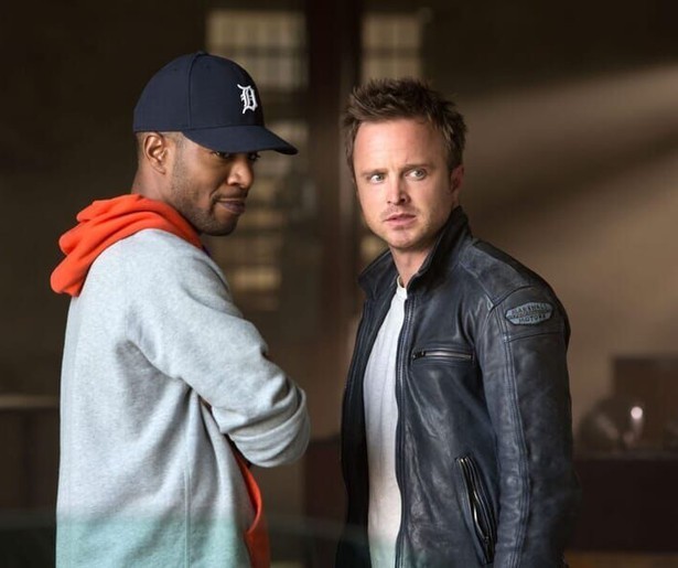 Aaron Paul scheurt in snelle auto's in Need for Speed