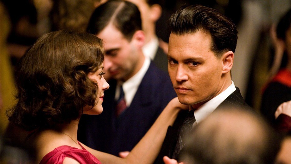 Johnny Depp en Marion Cotillard Actrice in Public Enemies Johnny Depp en Marion Cotillard Actrice in Public Enemies
