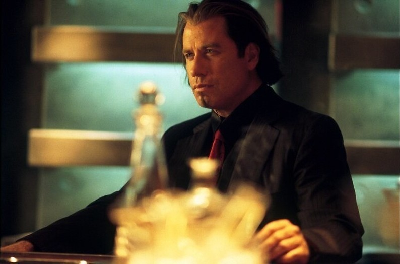 John Travolta huurt tophacker Hugh Jackman in John Travolta huurt tophacker Hugh Jackman in