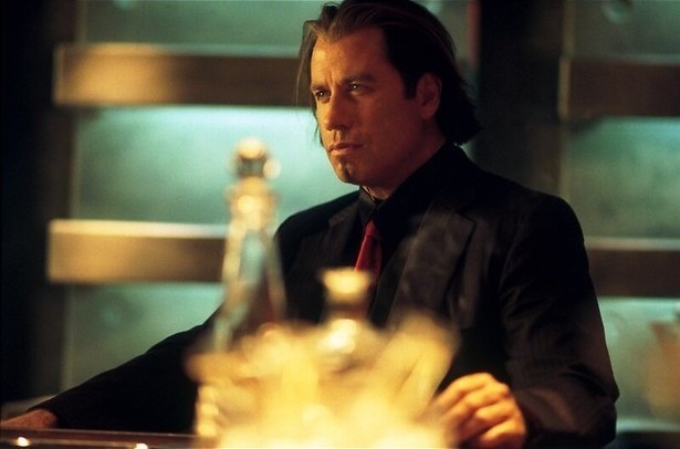 John Travolta huurt tophacker Hugh Jackman in