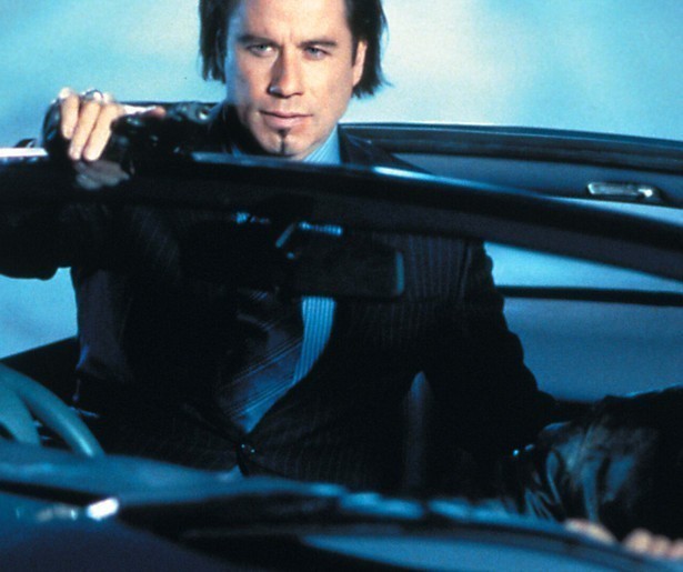 John Travolta huurt tophacker Hugh Jackman in