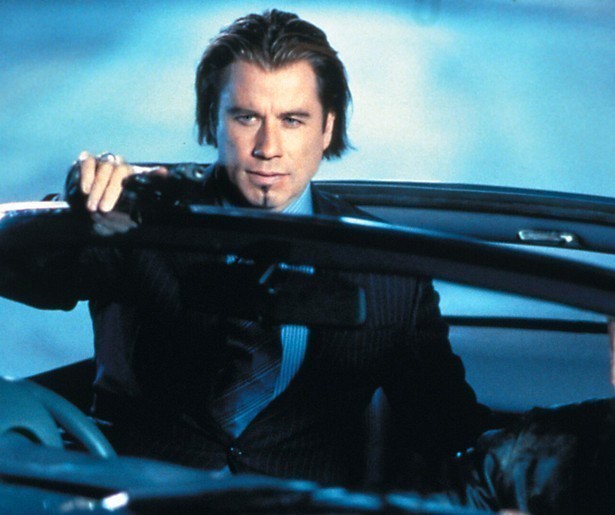 John Travolta huurt tophacker Hugh Jackman in