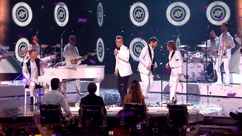 Videosnack: Robbie Williams en Take That herenigd bij X Factor Videosnack: Robbie Williams en Take That herenigd bij X Factor