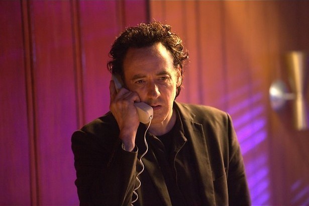 John Cusack en de tas