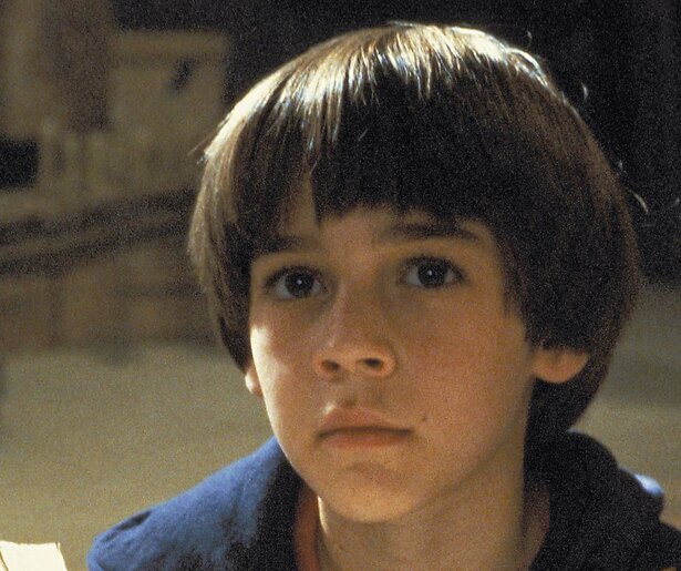 Barret Oliver ontsnapt aan de realiteit met een mysterieus boek in The NeverEnding Story